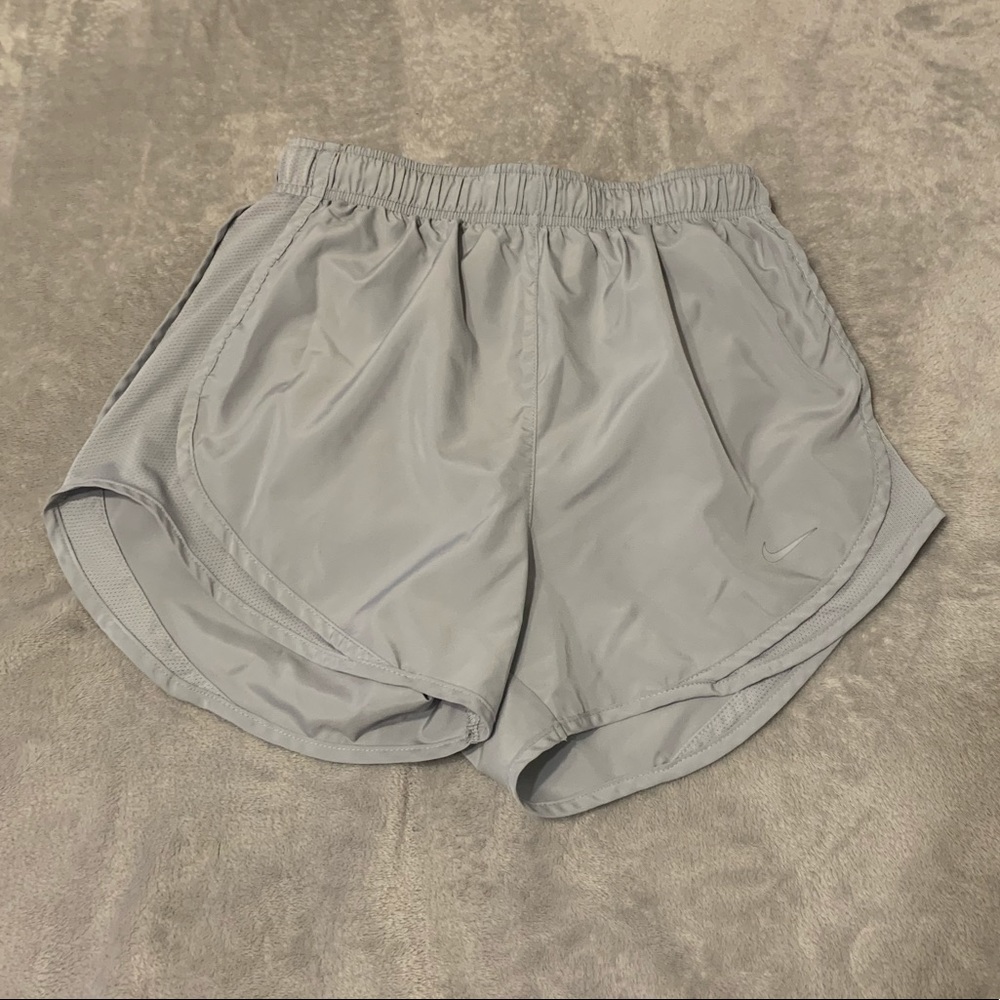 Silver Nike running shorts